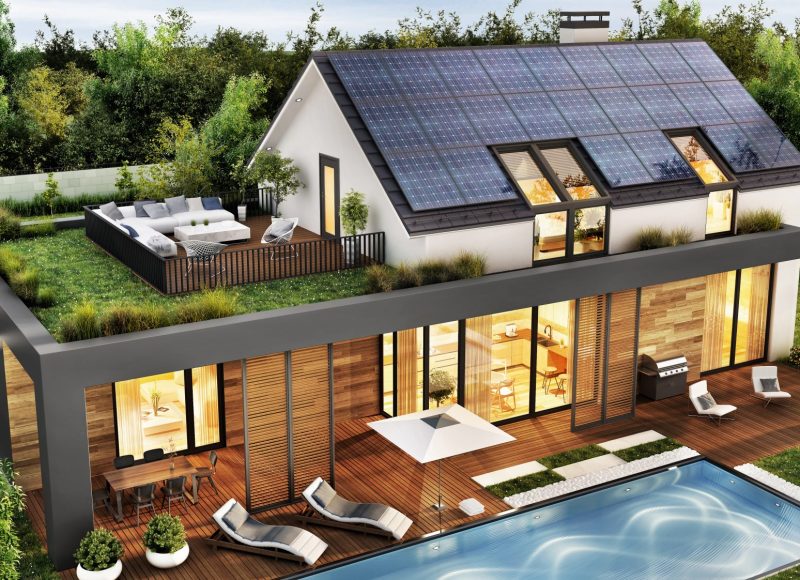 En haute-Savoie, Extension de maison à toit plat pour salon salle à manger avec une toiture terrasse végétalisée accessible au premier étage et panneaux photovoltaïques, en haute Savoie